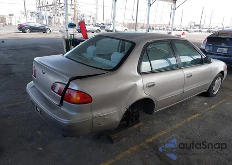 1998 Toyota Corolla Le z USA, uszkodzony, nr VIN 1NXBR18E9WZ085034